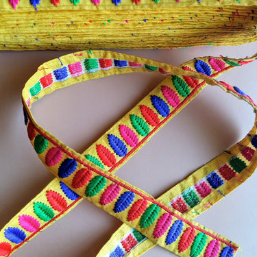 Yellow Trim With Green, Blue, Pink And Red Embroidery